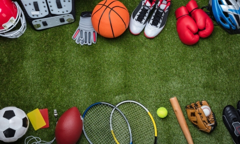 Various Sport Equipments On Grass