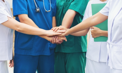 Doctorado de Salud pública Cooperation of people in the medical community teamwork with a hands together