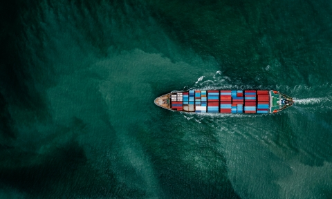 Container ship transporting cargo logistic to import export goods internationally around the world, including Asia Pacific and Europe, business and industry service of goods logistic transportation by container ship in sea concept,